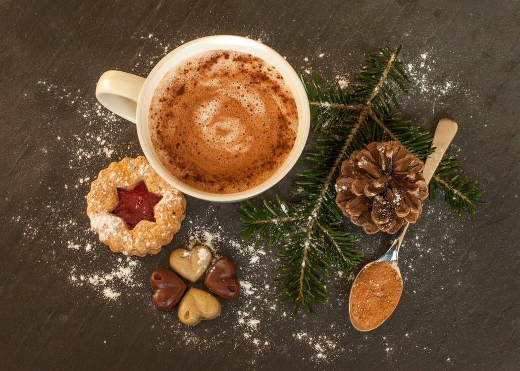 Coffee christmas cookies pine branch and pinecone