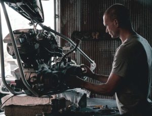 mechanic working on engine